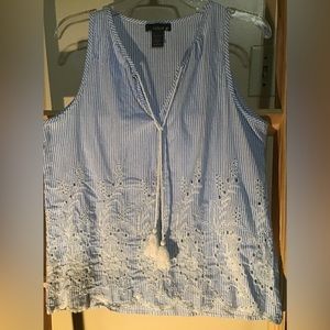 Women’s size medium, sleeveless, blue and white pinstripe Lola B top